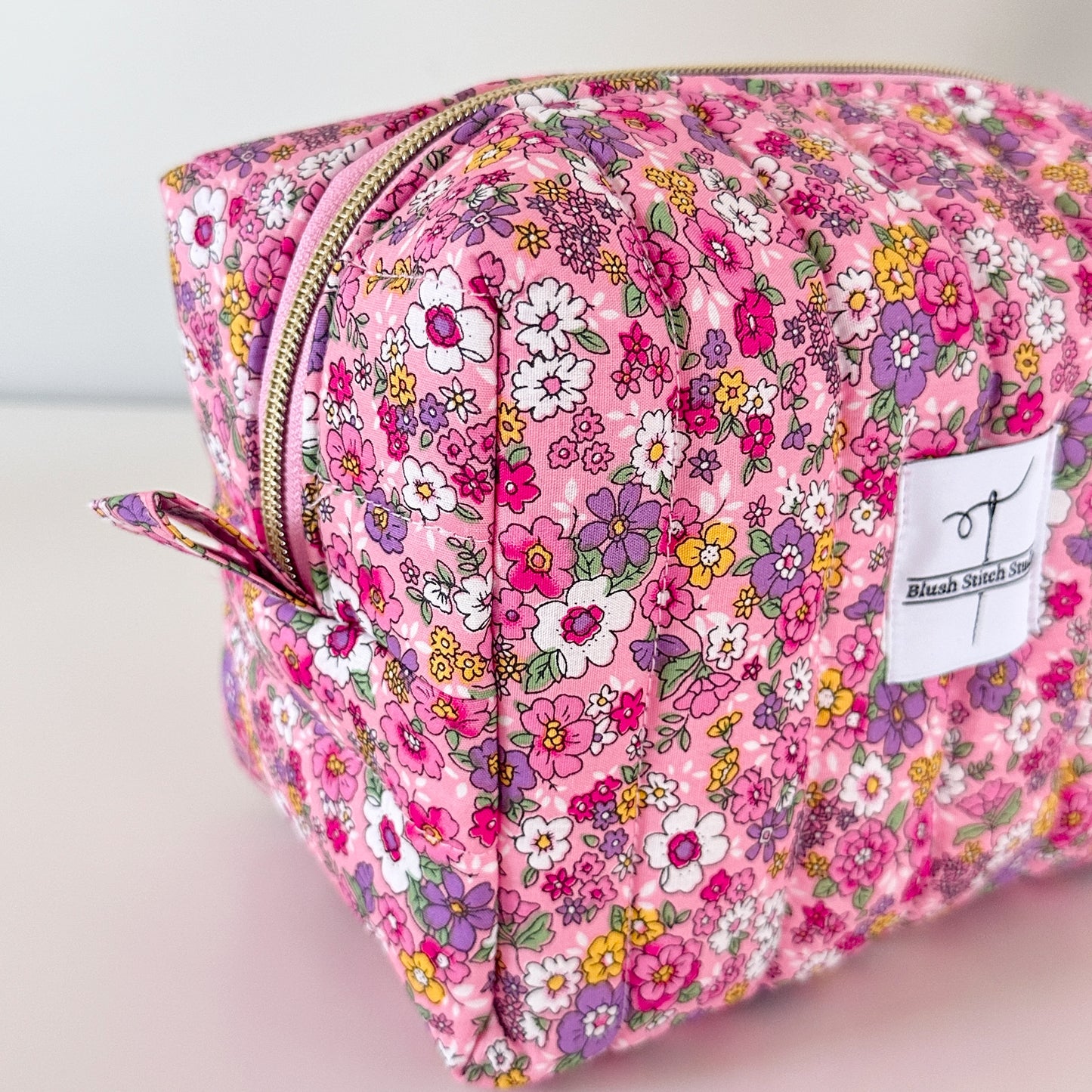 pink floral quilted makeup bag. made in canada