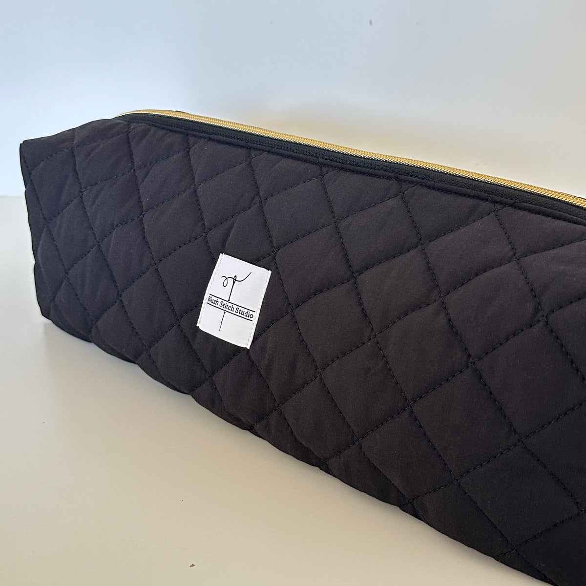 black quilted hair tool bag. made in canada