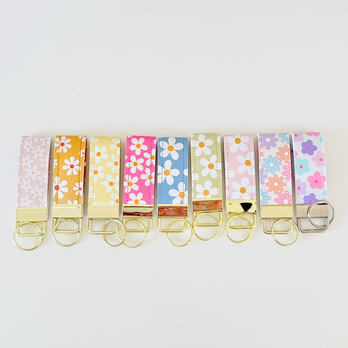 daisy floral pattern keychains made from vegan leather 