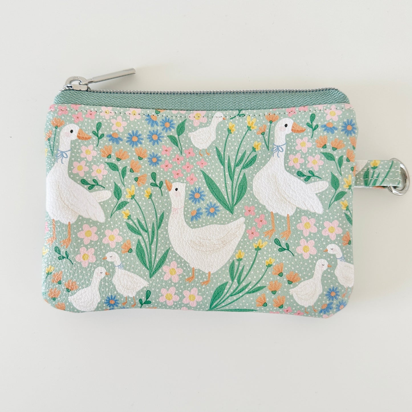 floral goose print coin purse made from  vegan leather