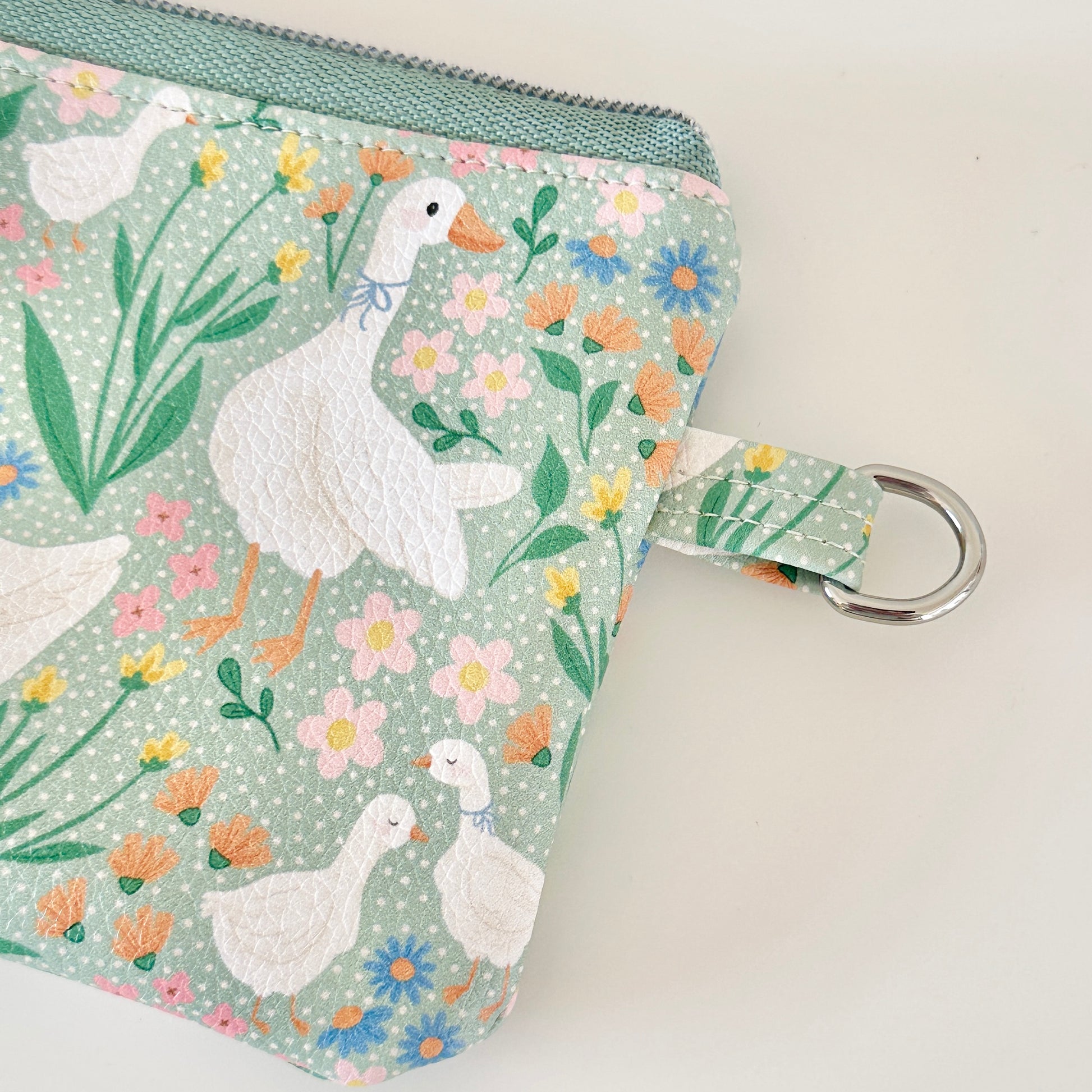 floral goose print coin purse made from  vegan leather