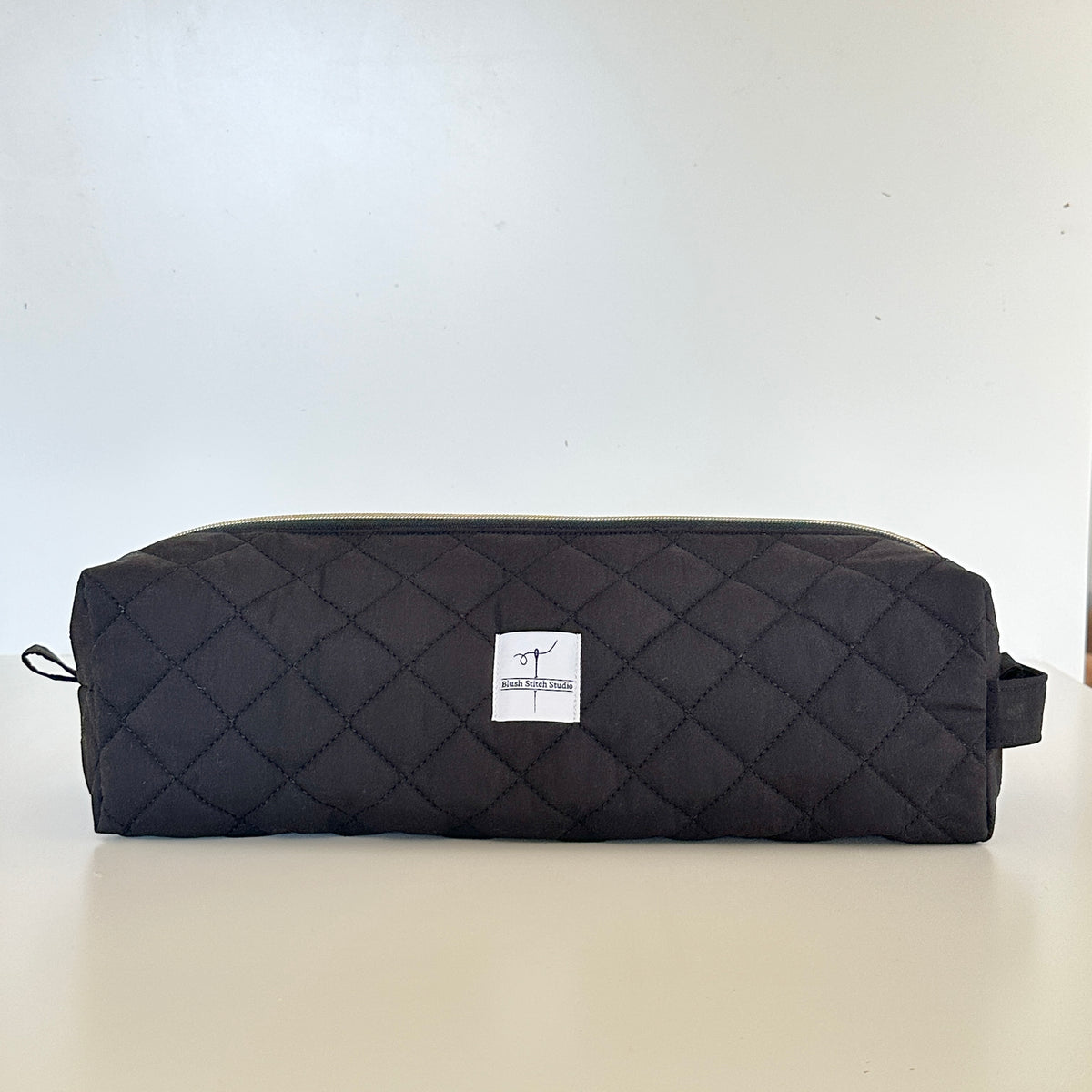 black quilted hair tool bag. made in canada