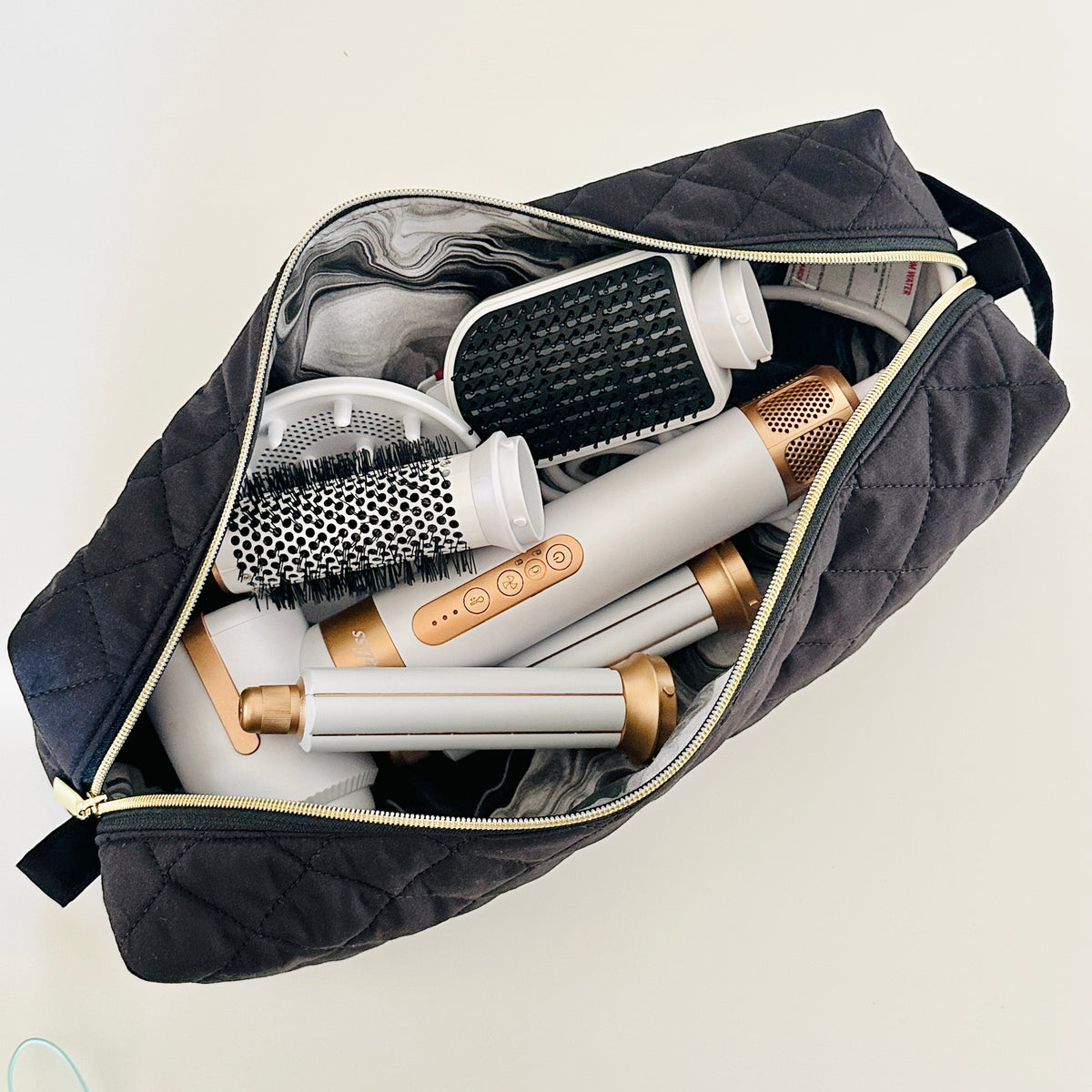 black quilted hair tool bag. made in canada