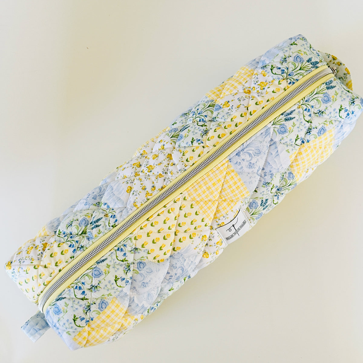 yellow patchwork quilted hair tool bag. made in canada