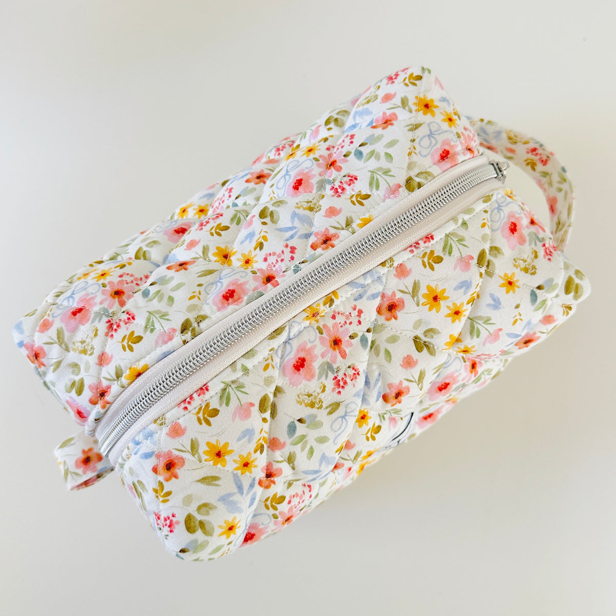white floral quilted makeup cosmetic bag. made in canada