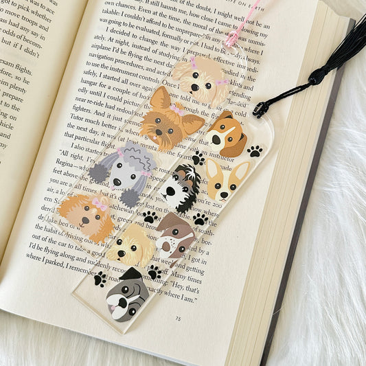 Set of dog-themed bookmarks on an open book
