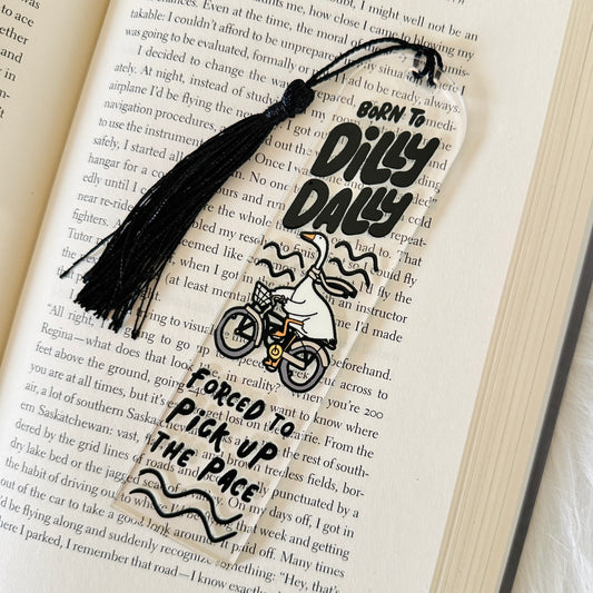 silly goose dilly dally Bookmark with tassel on an open book