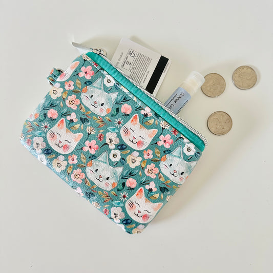 coin purse with cat and floral pattern on a white background