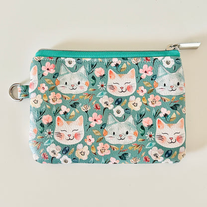 coin purse with cat and floral pattern on a white background