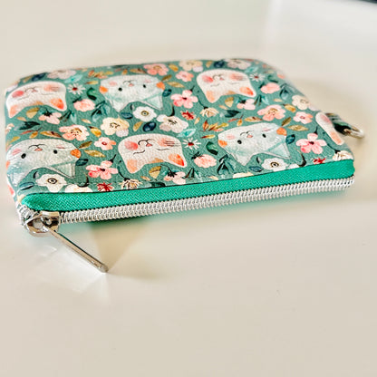 coin purse with cat and floral pattern on a white background
