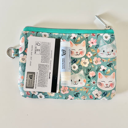 coin purse with cat and floral pattern on a white background