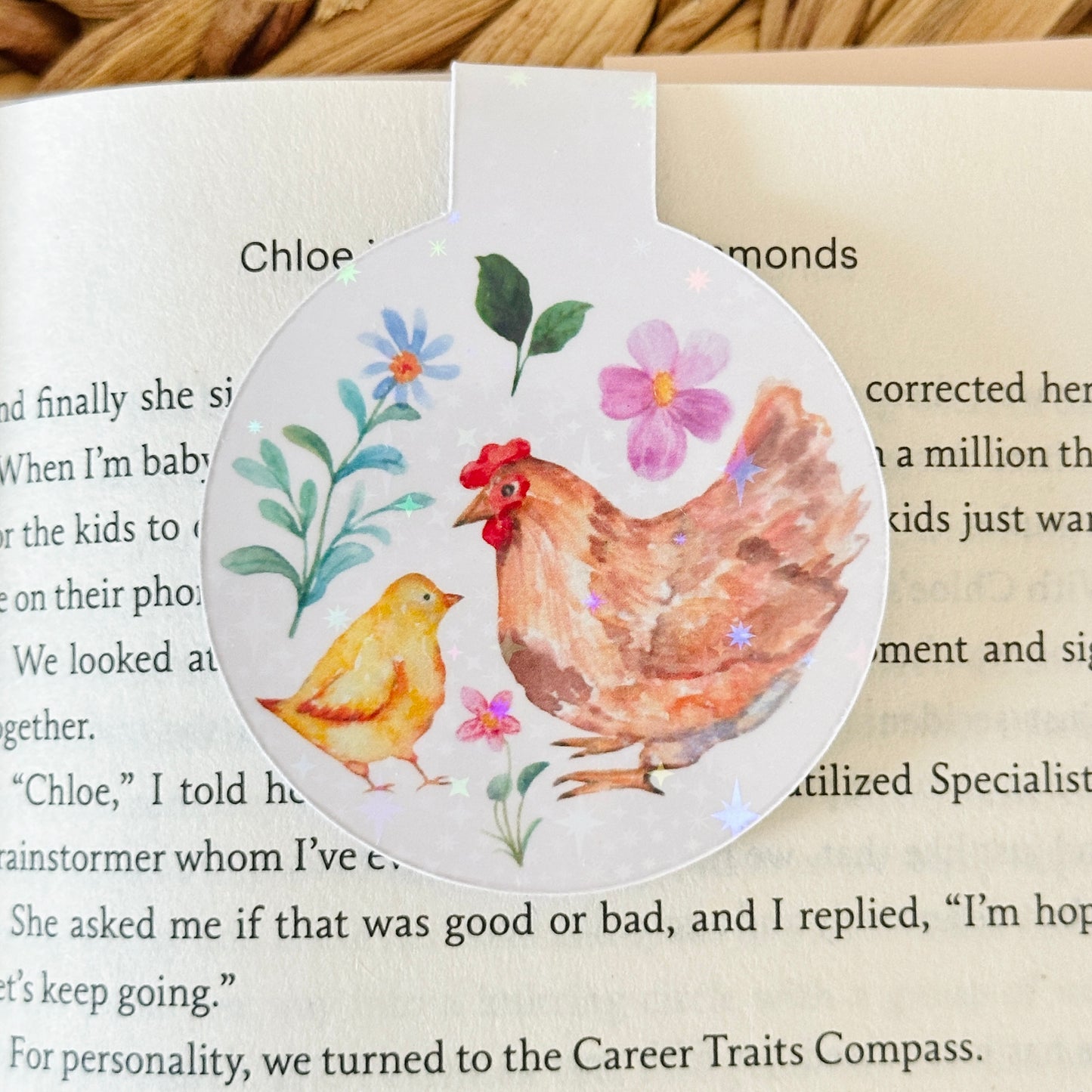 Magnetic bookmark with chicken design on a an open book