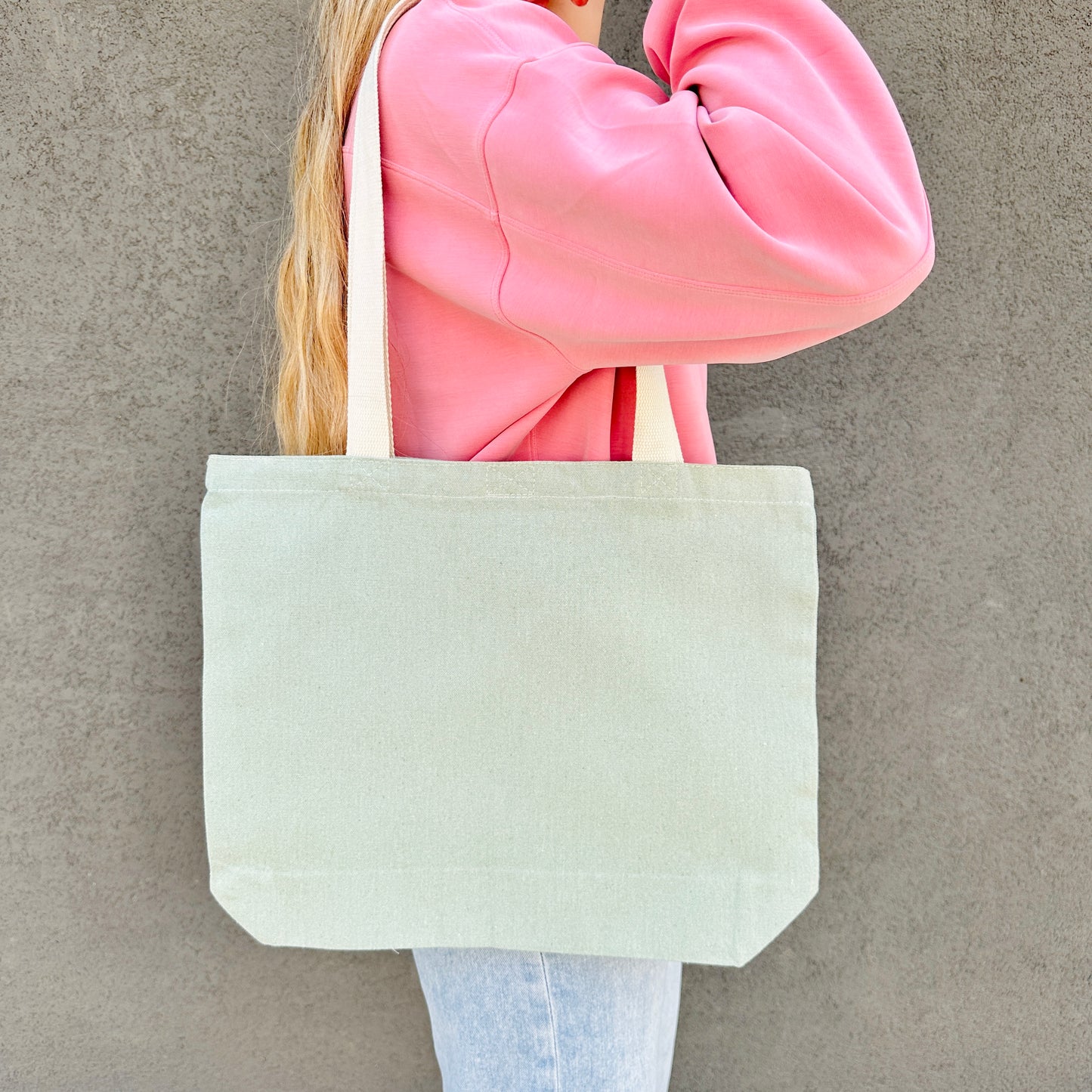 backside of tote back is solid green with no design 