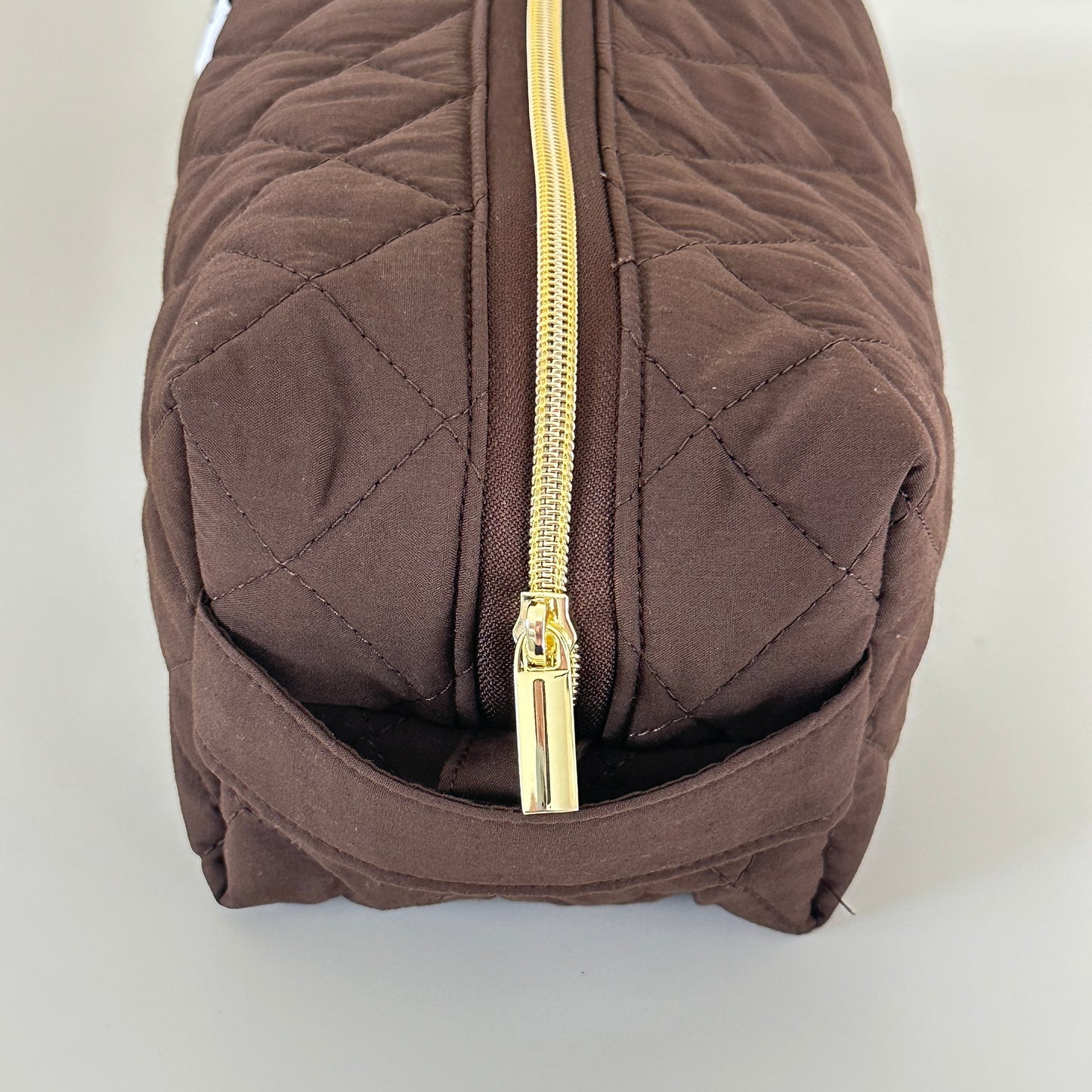 brown quilted hair tool bag