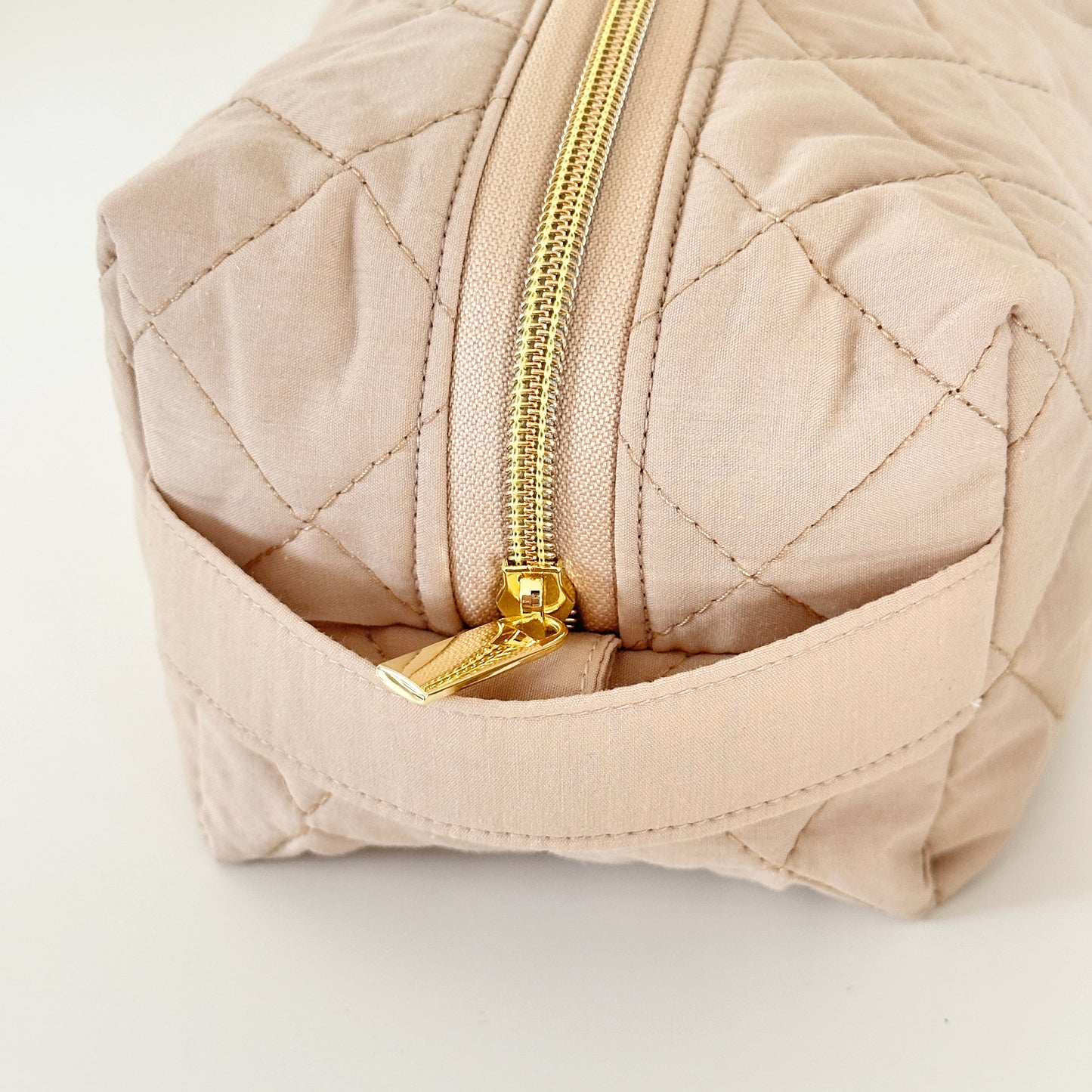 beige hair tool bag