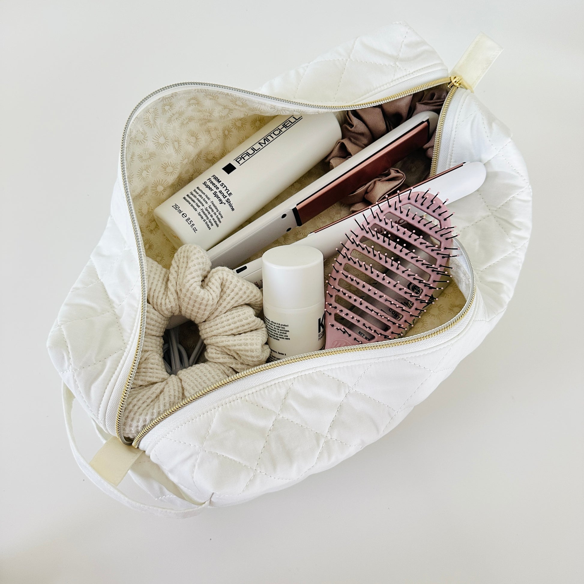 Ivory quilted hair tool bag