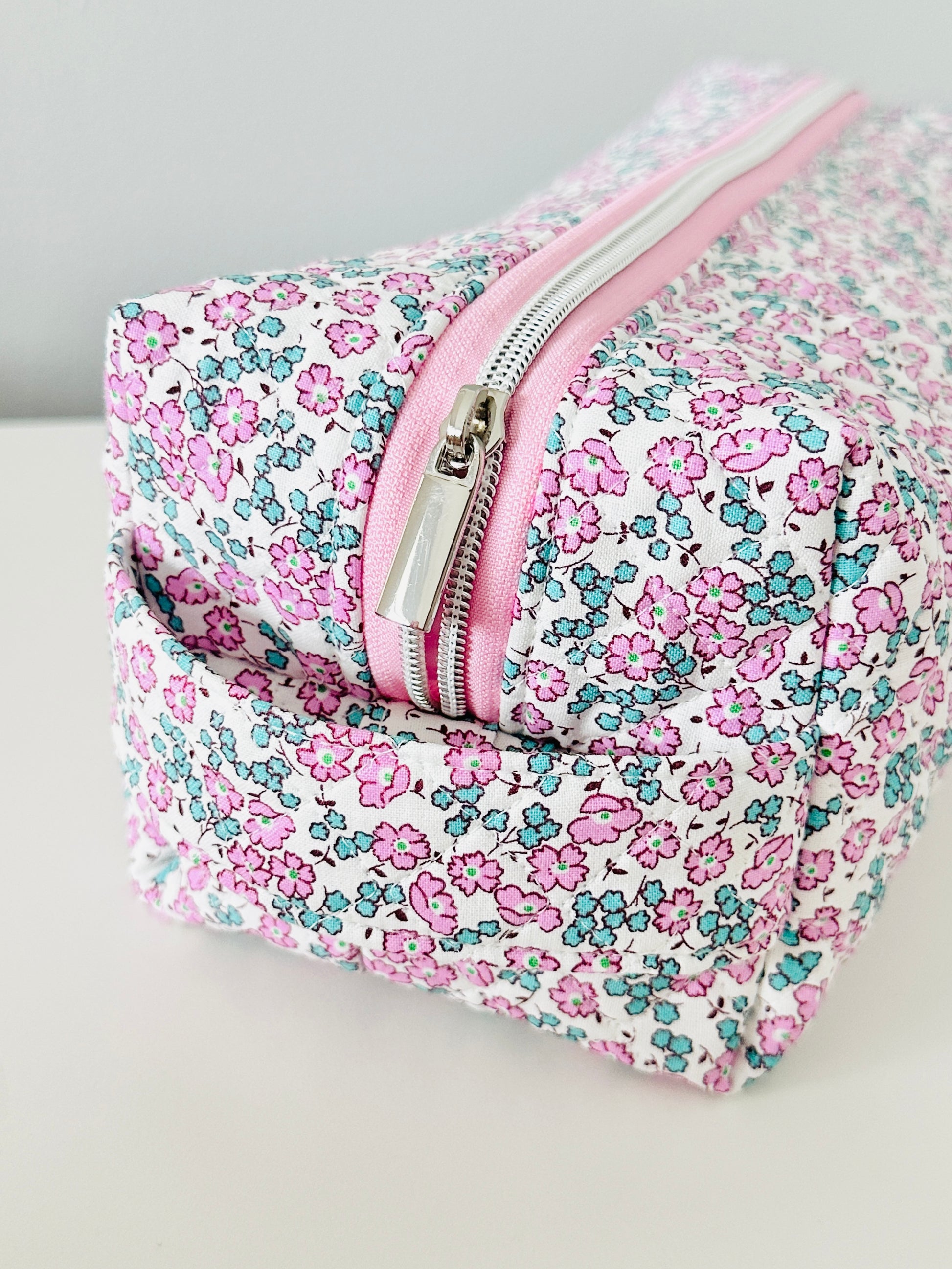 pink floral hair tool bag. 