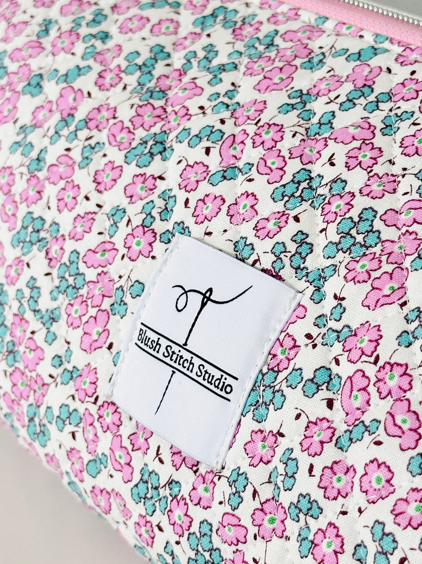 pink floral hair tool bag. 