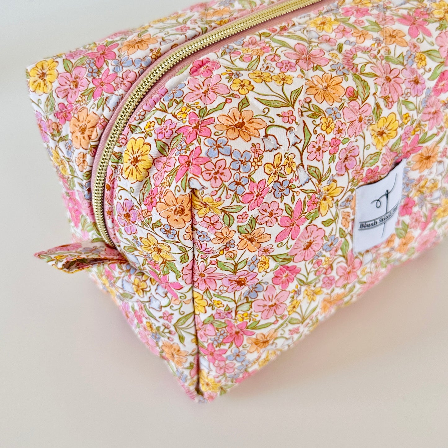 rainbow floral quilted makeup bag. made in canada