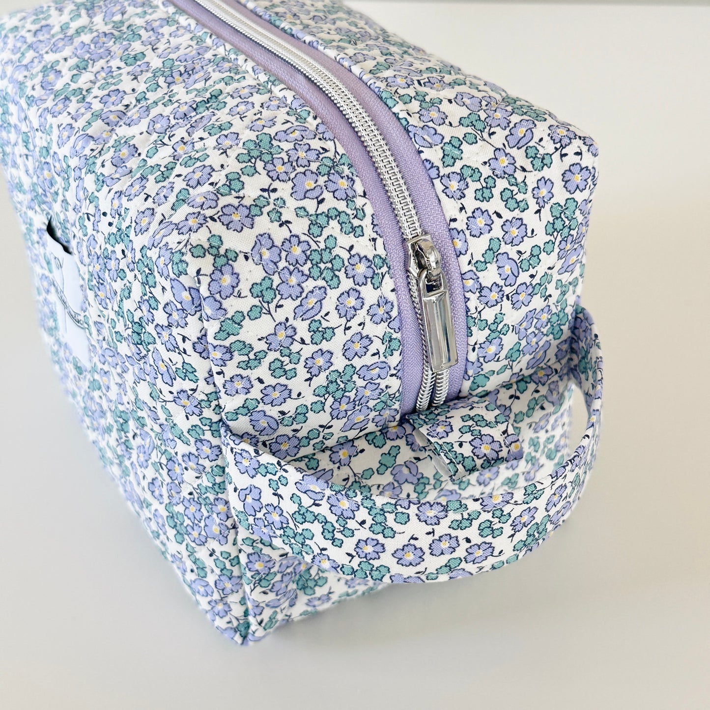 Blue Floral Quilted Makeup bag. Made in Canada