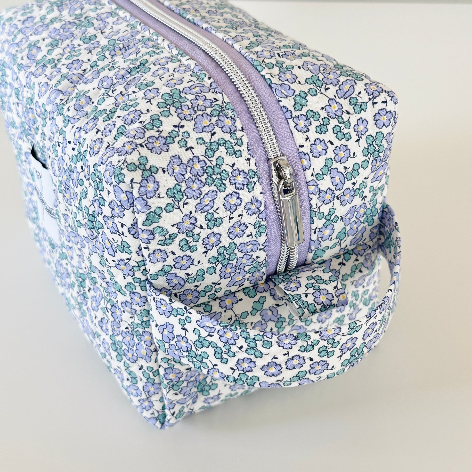 Blue Floral Quilted Makeup bag. Made in Canada