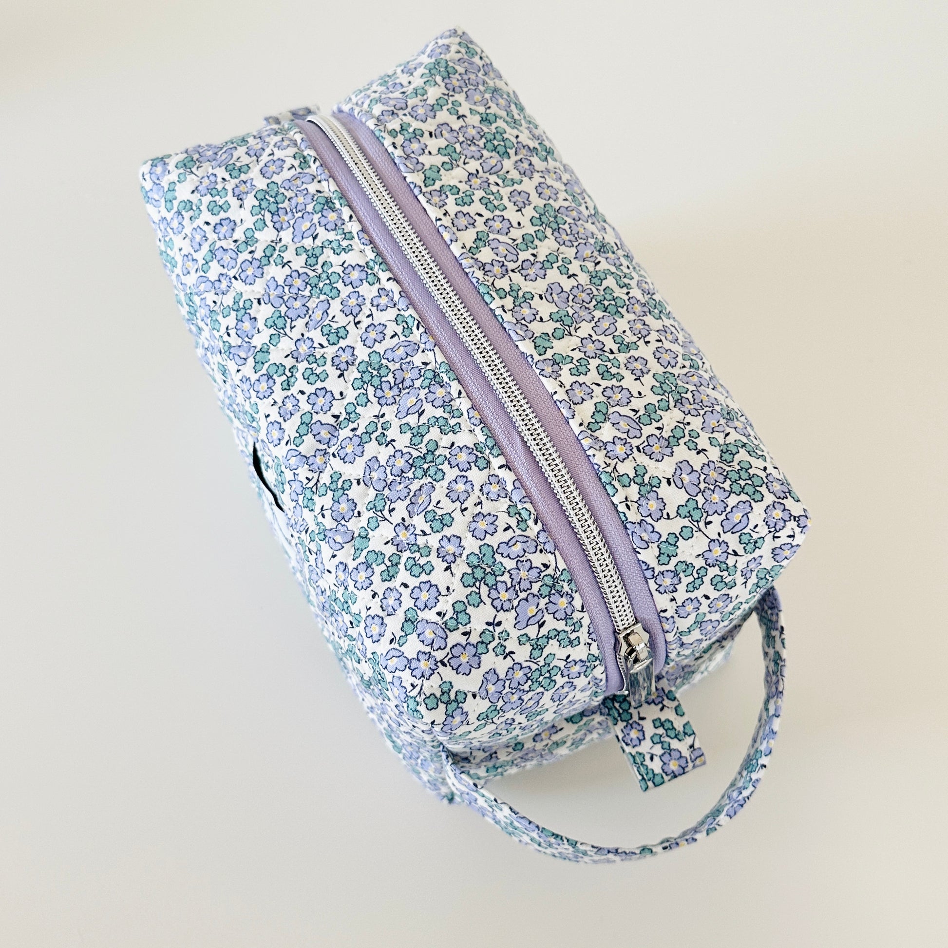 Blue Floral Quilted Makeup bag. Made in Canada