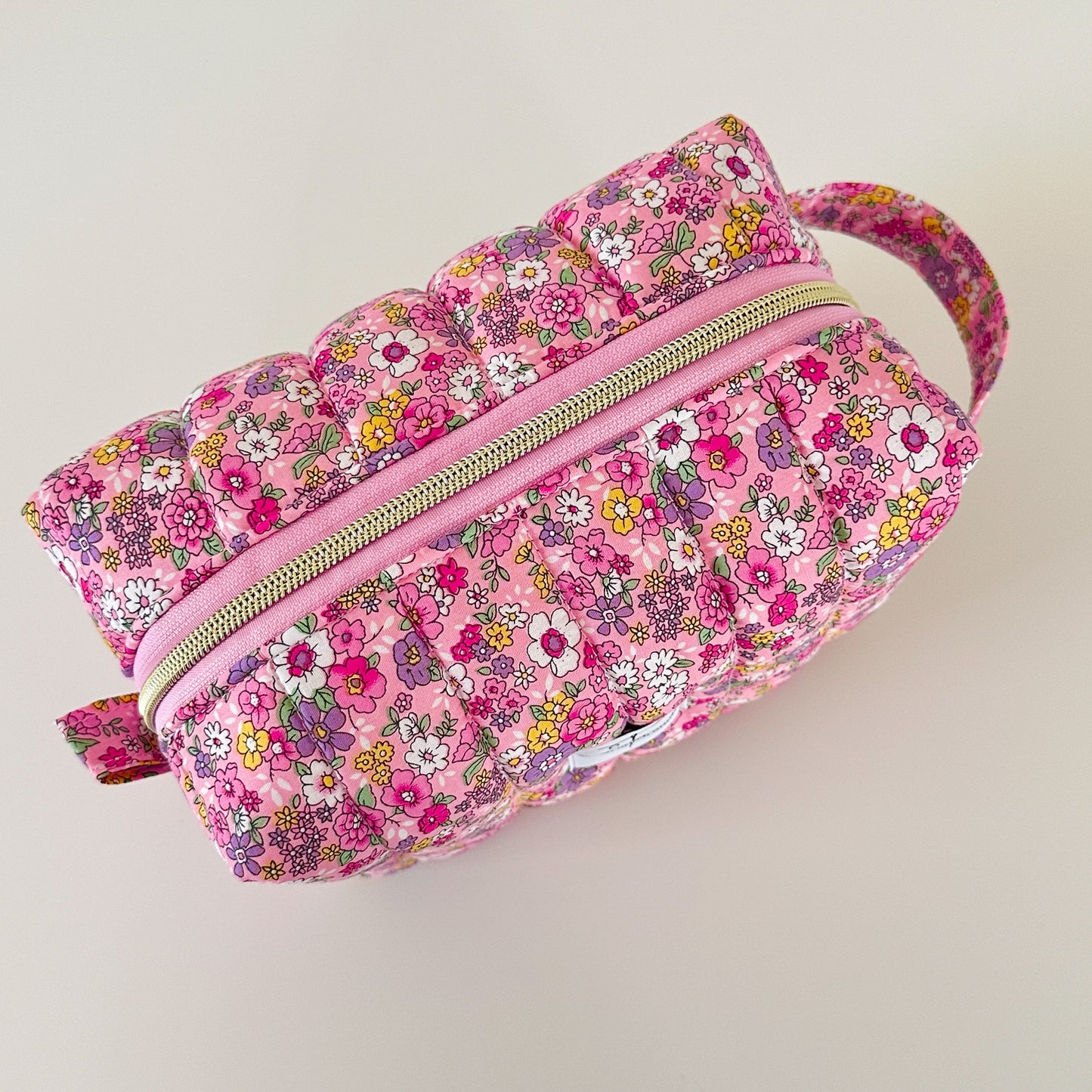 pink floral quilted makeup bag. made in canada