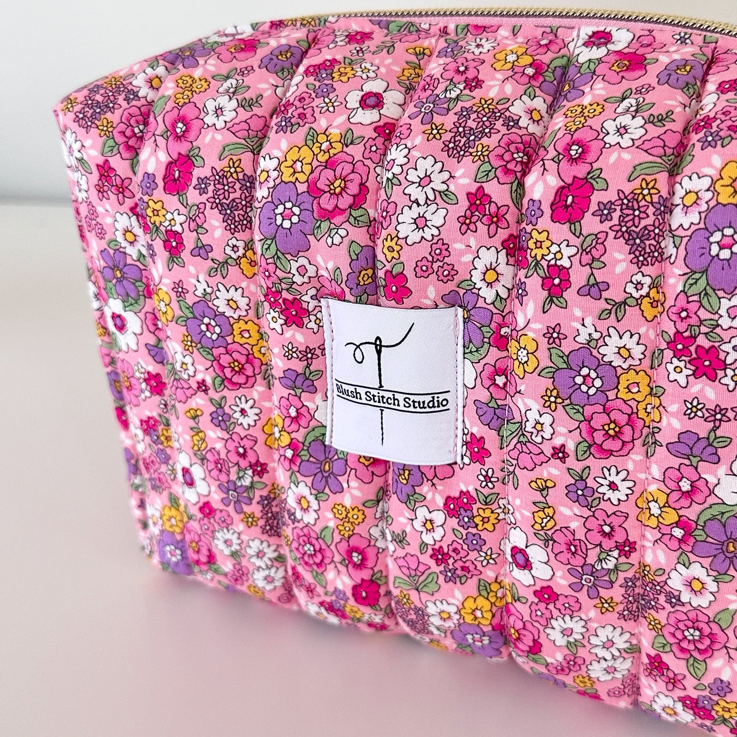 pink floral quilted makeup bag. made in canada