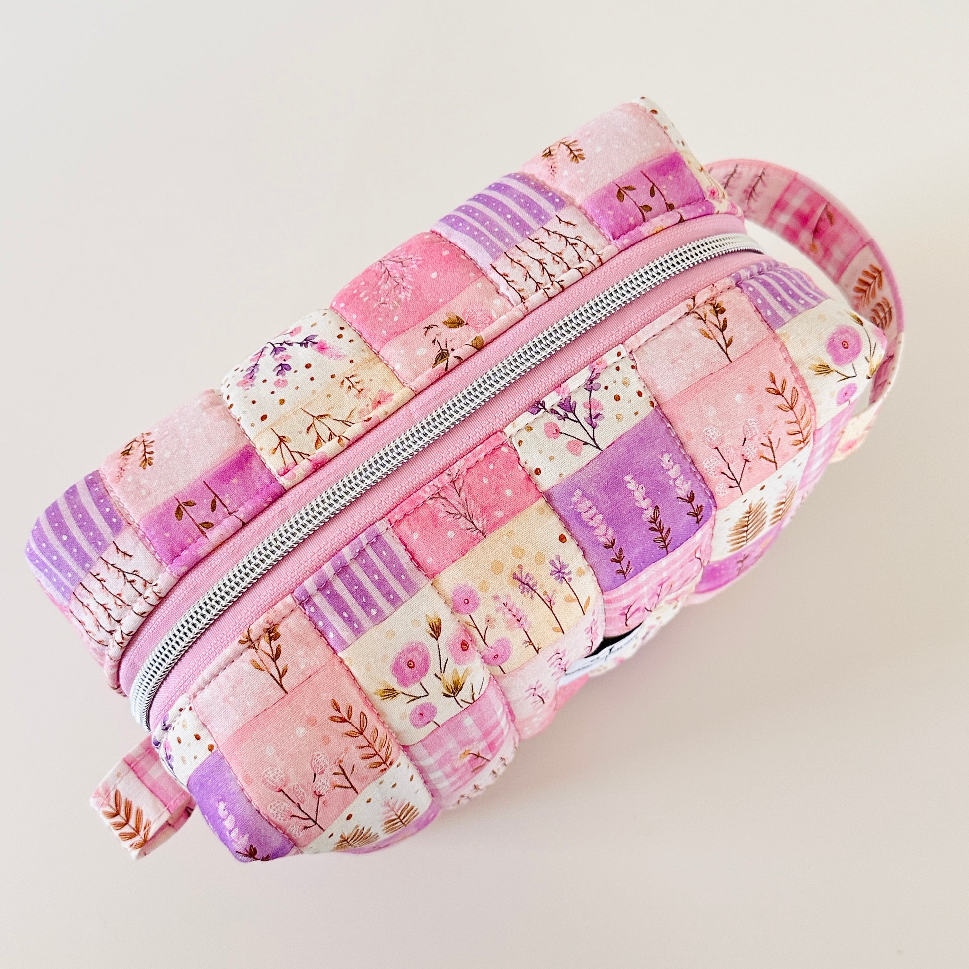 pink quilted patchwork makeup bag. made in canada. 
