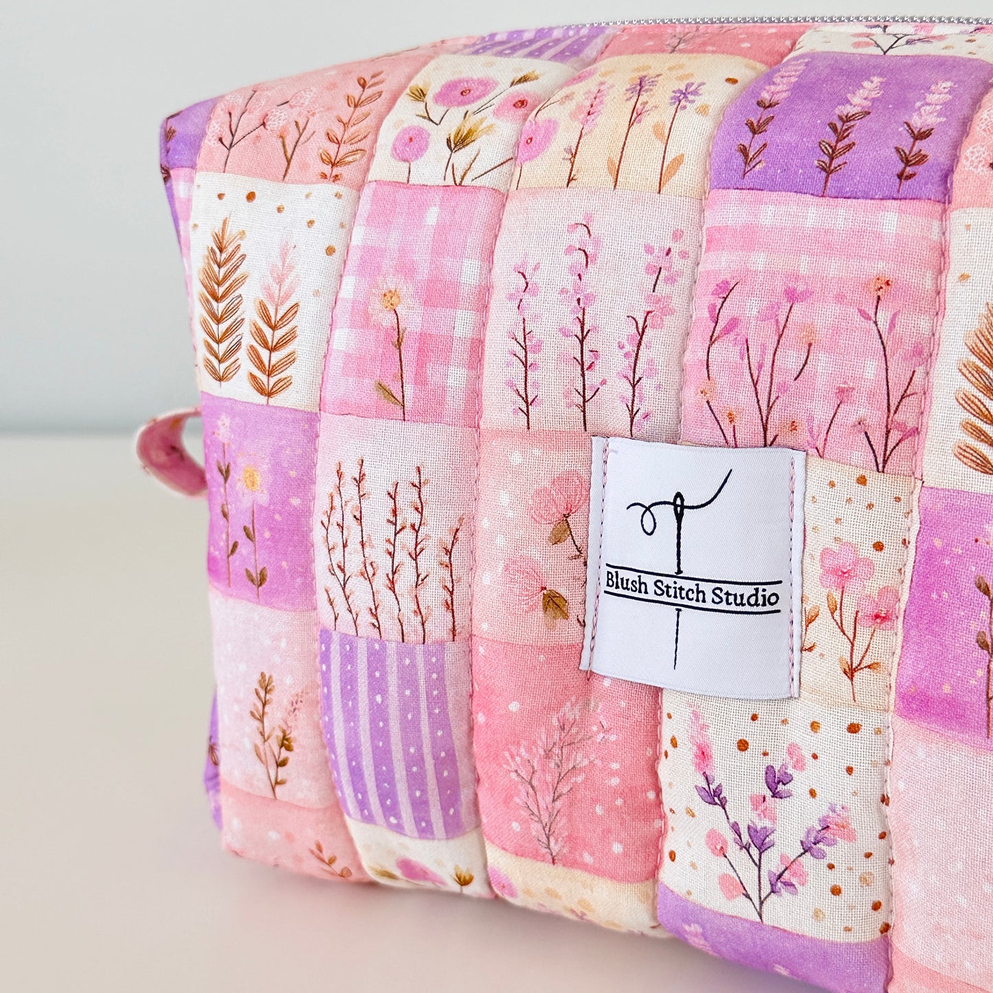 pink quilted patchwork makeup bag. made in canada. 