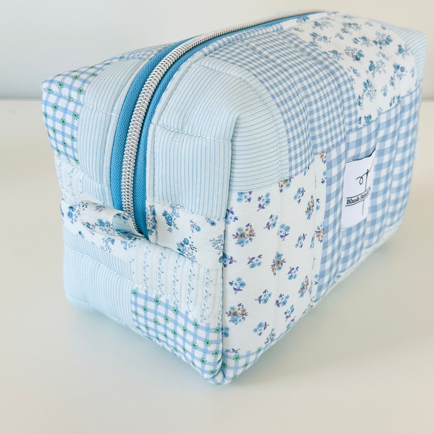 blue patchwork quilted makeup bag cosmetic pouch. made in canada. 