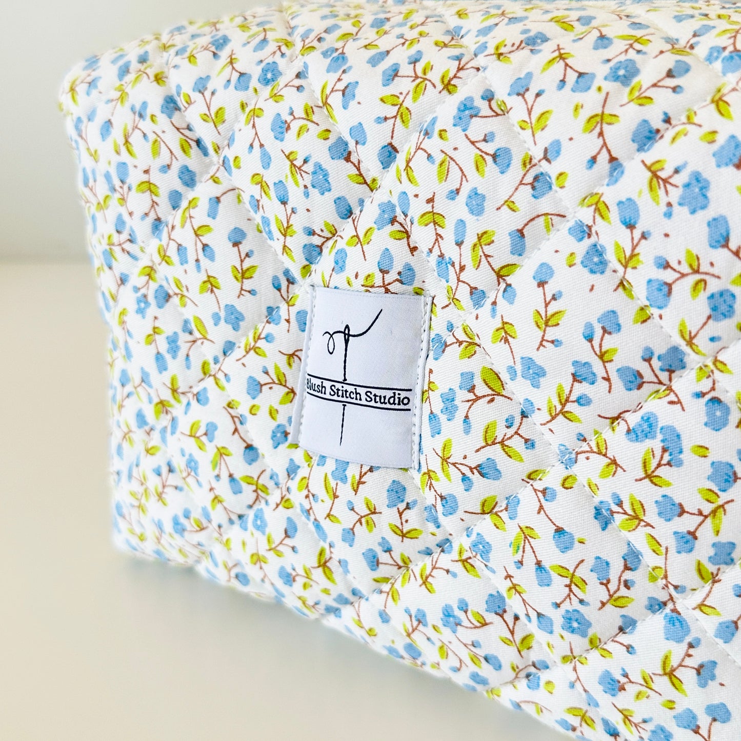 blue floral quilted makeup bag. handmade in canada. 