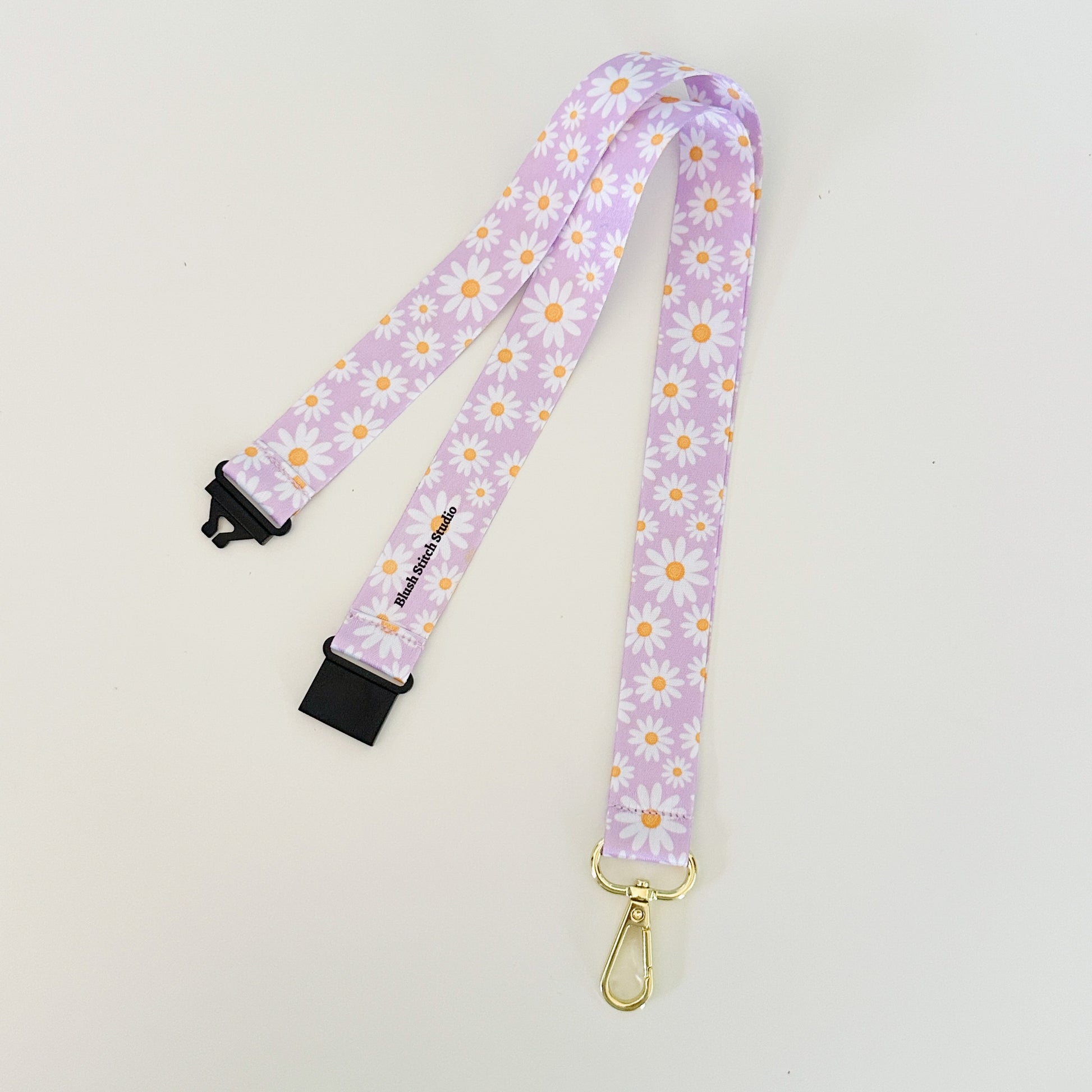 purple daisy floral lanyard
