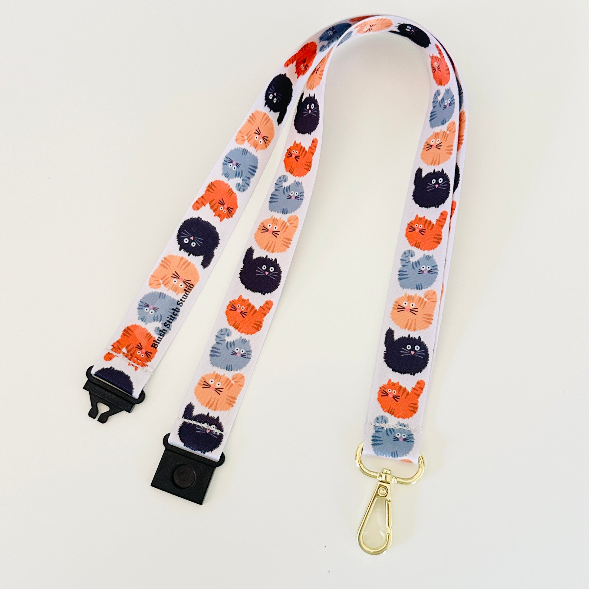 Lanyard with cat pattern on a white background