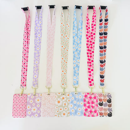 Set of colorful daisy floral  lanyards with various patterns on a white background