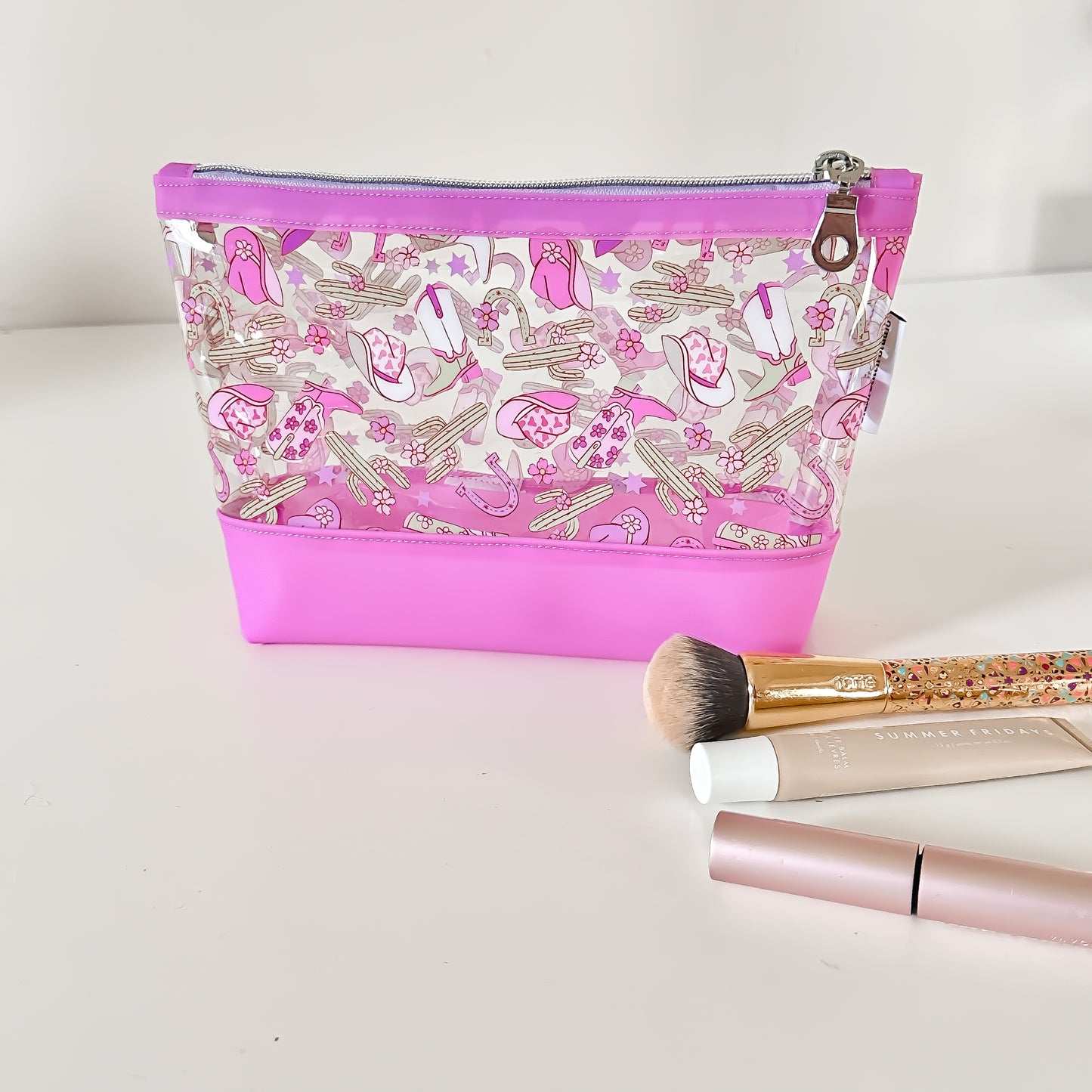 clear cosmetic makeup bag with a cowgirl pattern 