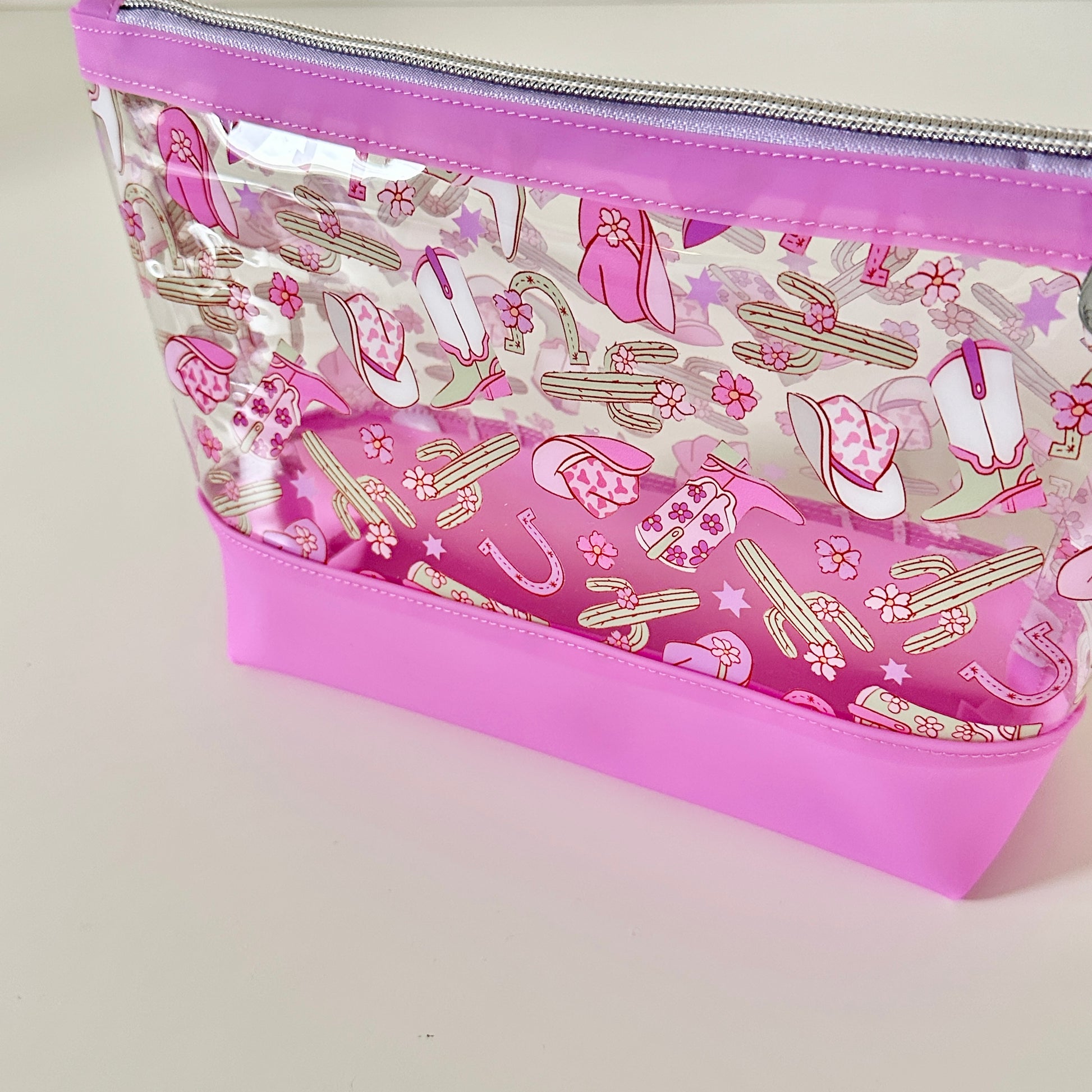 clear cosmetic makeup bag with a cowgirl pattern 