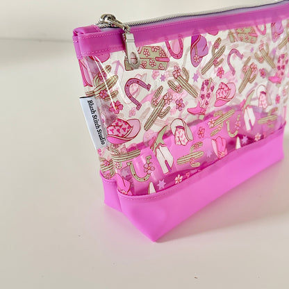 clear cosmetic makeup bag with a cowgirl pattern 