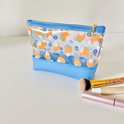 clear makeup bag with a blue and yellow lemon pattern