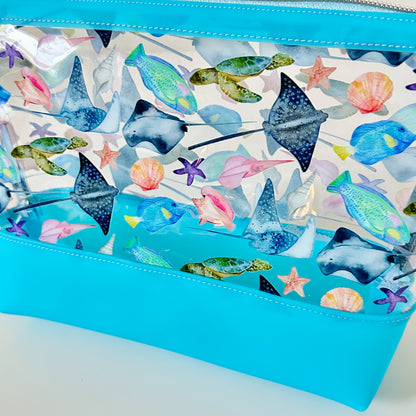 clear makeup bag with a tropical fish and stingray pattern 