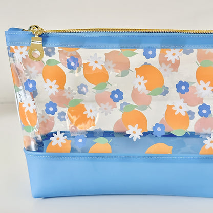 clear makeup bag with a blue and yellow lemon pattern