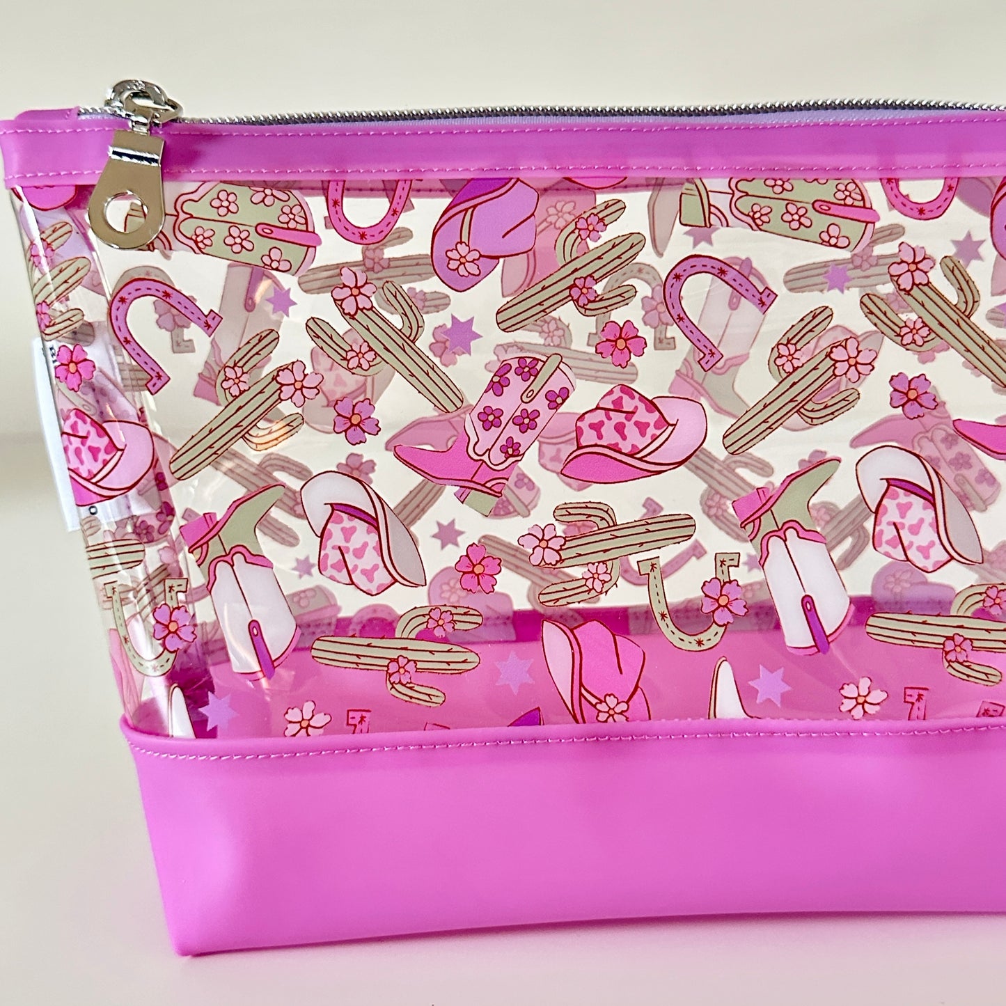 clear cosmetic makeup bag with a cowgirl pattern 