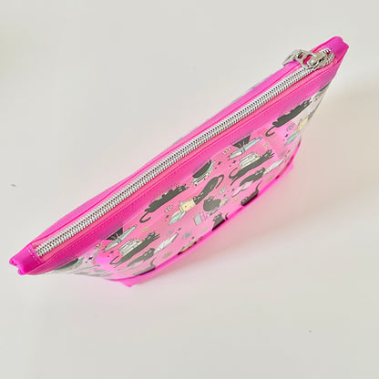 clear makeup bag with a black cat and book pattern pink bottom