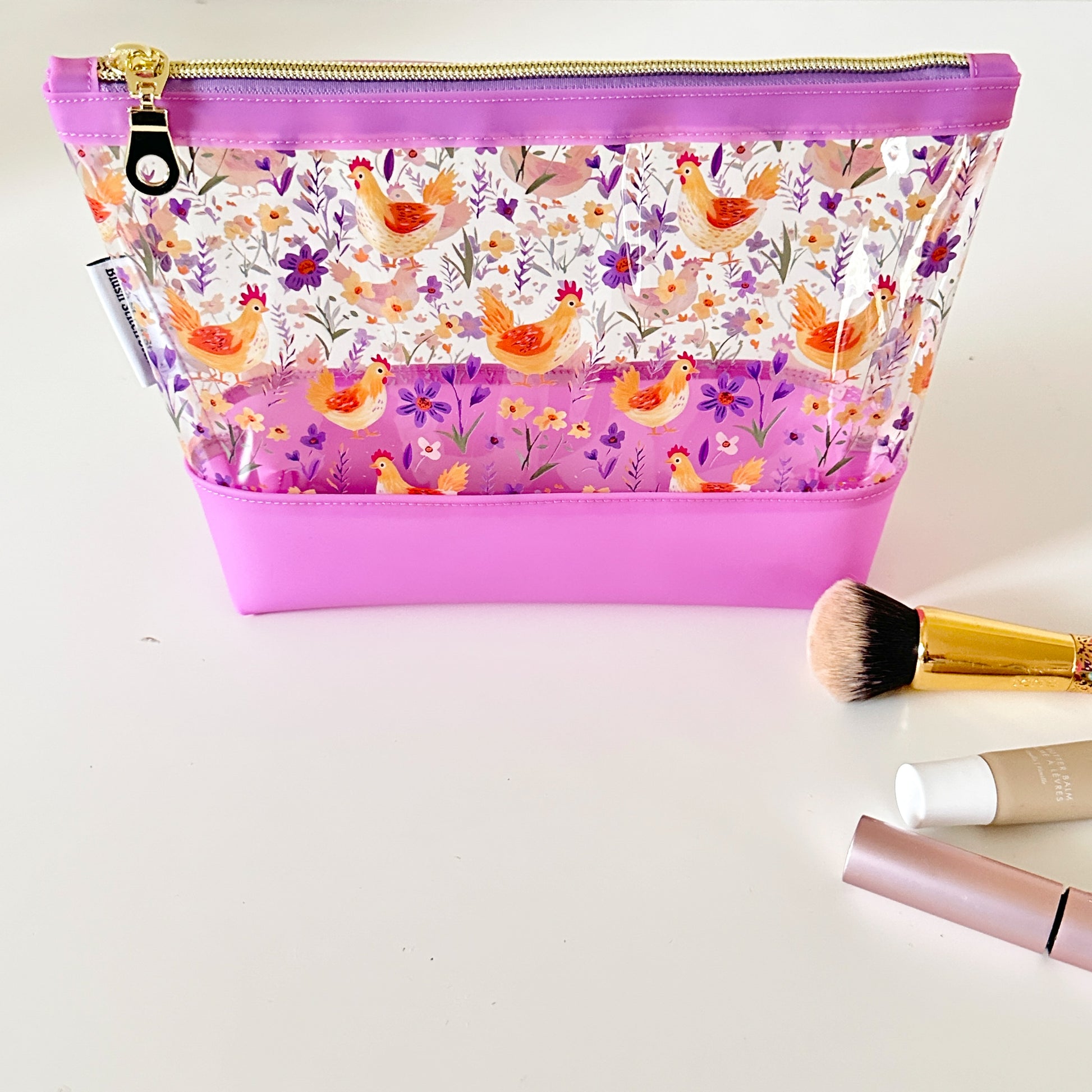 Clear makeup bag with chicken and floral pattern 