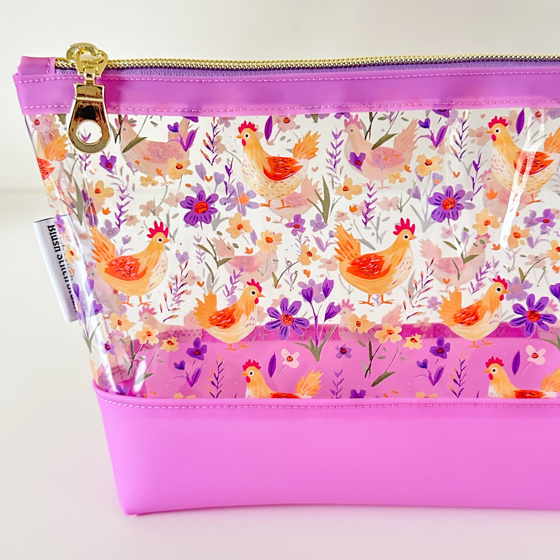Clear makeup bag with chicken and floral pattern 