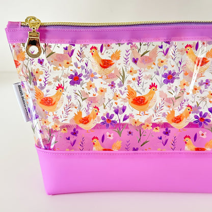 Clear makeup bag with chicken and floral pattern 
