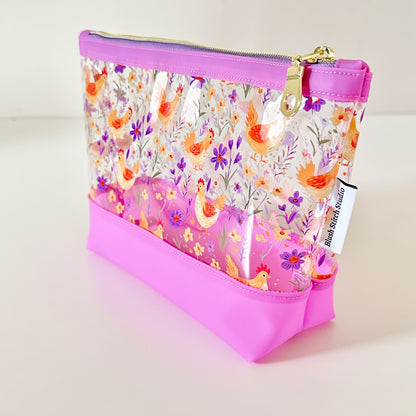 Clear makeup bag with chicken and floral pattern 