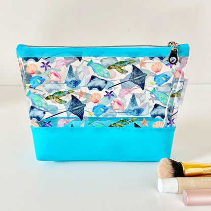 clear makeup bag with a tropical fish and stingray pattern 