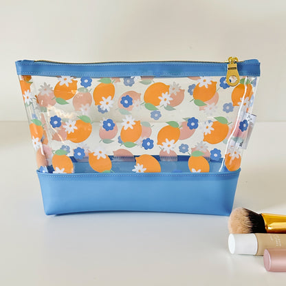 clear makeup bag with a blue and yellow lemon pattern