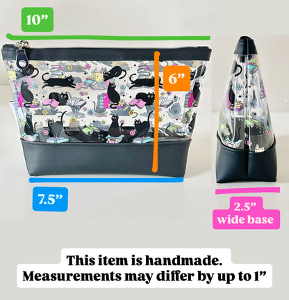 Handmade pouch with cat pattern and measurements on a light gray background